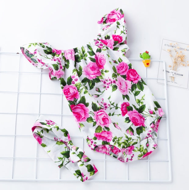 "FlutterSleeve Cotton Baby Romper"**Product Description:** 


 


 Dress your baby girl in style and comfort with the
 
  **FlutterSleeve Cotton Baby Romper**
 
 . 


 

Made from 100% soft, breathabZIP UP EXPRESSBaby"FlutterSleeve Cotton Baby Romper"